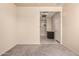 Versatile flex room with neutral paint, carpet, and access to the bathroom at 2176 W Larissa Ln, San Tan Valley, AZ 85144