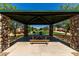 A shaded picnic area provides a comfortable and scenic outdoor dining space for community residents to enjoy at 2176 W Larissa Ln, San Tan Valley, AZ 85144