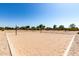Sand volleyball court in a community park, perfect for outdoor games and recreation at 2176 W Larissa Ln, San Tan Valley, AZ 85144