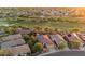 Aerial view of a home with solar panels in a golf course community at 22432 N 52Nd Pl, Phoenix, AZ 85054