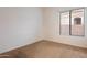 Neutral bedroom featuring carpet, a window with blinds, and light colored walls at 22432 N 52Nd Pl, Phoenix, AZ 85054