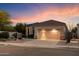 Charming single-story home with desert landscaping and a two-car garage at 22432 N 52Nd Pl, Phoenix, AZ 85054