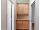 Hallway featuring built-in storage cabinets at 22432 N 52Nd Pl, Phoenix, AZ 85054