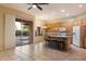Open kitchen and living area with backyard views at 22432 N 52Nd Pl, Phoenix, AZ 85054