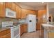 Open kitchen with granite counters and stainless steel sink at 22432 N 52Nd Pl, Phoenix, AZ 85054