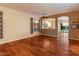 Bright living room showcasing hardwood floors and open layout at 22432 N 52Nd Pl, Phoenix, AZ 85054