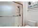 Modern shower with glass door and bronze fixtures at 22432 N 52Nd Pl, Phoenix, AZ 85054