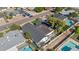 An aerial view of the house shows its backyard swimming pool, modern roof, and well-manicured landscaping at 2316 N 81St St, Scottsdale, AZ 85257