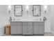 Elegant bathroom featuring dual vanities, stylish lighting, and sleek design, blending comfort with modern style at 2316 N 81St St, Scottsdale, AZ 85257