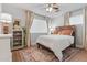 A cozy bedroom with a patterned rug, a wooden headboard, and soft, natural light creating a serene atmosphere at 2316 N 81St St, Scottsdale, AZ 85257