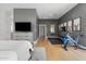A versatile bonus room offering an exercise area, media space, and elegant decor for a functional and stylish home at 2316 N 81St St, Scottsdale, AZ 85257