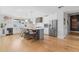 Modern kitchen featuring a large central island with seating, stainless steel appliances, and bright lighting for a stylish look at 2316 N 81St St, Scottsdale, AZ 85257