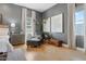 Cozy bedroom area featuring soft lighting, a comfortable armchair, and elegant décor, offering a serene retreat at 2316 N 81St St, Scottsdale, AZ 85257