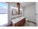 Primary bathroom showcasing a dual sink vanity with ample cabinet storage at 23833 N 36Th Dr, Glendale, AZ 85310