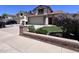 Charming two-story home features a brick facade, a two-car garage, and well-maintained landscaping at 23833 N 36Th Dr, Glendale, AZ 85310