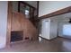 Bright living room features a fireplace, wood beams, hardwood floors, and abundant natural light at 23833 N 36Th Dr, Glendale, AZ 85310