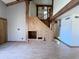 Spacious living room boasts wood floors, wood beams, and a staircase, offering a warm and inviting atmosphere at 23833 N 36Th Dr, Glendale, AZ 85310