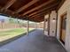This covered patio offers an outdoor living space with a view of the backyard at 23833 N 36Th Dr, Glendale, AZ 85310