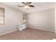 Neutral bedroom featuring carpeted floors, a ceiling fan, and window coverings, perfect for relaxation and comfort at 26272 N 73Rd Dr, Peoria, AZ 85383