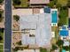Breathtaking aerial view of a luxurious home featuring a private pool, manicured lawn, and a modern outdoor kitchen at 2630 E Lovebird Ln, Gilbert, AZ 85297