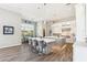 Open kitchen and dining area featuring a large island with bar stool seating at 2630 E Lovebird Ln, Gilbert, AZ 85297