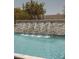 Stunning pool featuring decorative fountains flowing into crystal-clear water, creating a tranquil atmosphere at 2630 E Lovebird Ln, Gilbert, AZ 85297