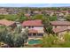 Aerial view showcasing the home's backyard oasis, pool, and neighborhood at 27053 N 172Nd Ln, Surprise, AZ 85387