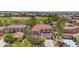 Overhead view of the home in a vibrant community with landscaped surroundings at 27053 N 172Nd Ln, Surprise, AZ 85387