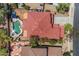 Backyard featuring a pool, hot tub, patio area, and lush landscaping at 27053 N 172Nd Ln, Surprise, AZ 85387