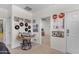 Large bedroom with carpeted floor and abundant natural light from the large windows at 27053 N 172Nd Ln, Surprise, AZ 85387
