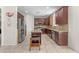 Well-equipped kitchen featuring stainless steel appliances, granite countertops, a kitchen island, and ample cabinetry at 27053 N 172Nd Ln, Surprise, AZ 85387