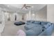 Upstairs living room featuring plush sectional sofa, and lots of space for activities at 27053 N 172Nd Ln, Surprise, AZ 85387