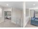 Upstairs loft area with carpet, ideal for a playroom or additional living space at 27053 N 172Nd Ln, Surprise, AZ 85387