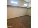 Spacious walk-in closet with carpeted floors and custom shelving for ample storage at 29906 W Whitton Ave, Buckeye, AZ 85396