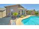 Backyard featuring a pool and covered patio at 3128 W Belle Ave, San Tan Valley, AZ 85144