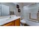 Cozy bathroom with framed mirror and shower with glass doors at 3128 W Belle Ave, San Tan Valley, AZ 85144