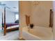 Relaxing bathroom with a soaking tub, and access to main bedroom, creating a spa-like experience at 3128 W Belle Ave, San Tan Valley, AZ 85144