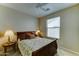 Inviting bedroom with ambient lighting, comfortable bedding, and bedside tables at 3128 W Belle Ave, San Tan Valley, AZ 85144