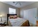 Cozy bedroom with a comfortable bed, soft lighting, and a sliding closet door at 3128 W Belle Ave, San Tan Valley, AZ 85144