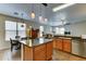 Eat-in kitchen featuring an island and ample counter space at 3128 W Belle Ave, San Tan Valley, AZ 85144