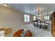 Bright and airy living space featuring an open floor plan and a glimpse into the dining area at 3128 W Belle Ave, San Tan Valley, AZ 85144