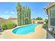 Backyard pool surrounded by lush greenery at 3128 W Belle Ave, San Tan Valley, AZ 85144