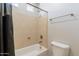 Clean bathroom with a bathtub and shower combination at 3173 E Canyon Way, Chandler, AZ 85249
