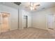 Bedroom with neutral carpeting, open doorway, and closet access at 3173 E Canyon Way, Chandler, AZ 85249