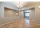 Inviting dining room features tile floors and stylish chandelier lighting at 3173 E Canyon Way, Chandler, AZ 85249