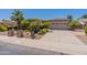 Beautiful single-Gathering home with a driveway leading to an attached two-car garage at 3173 E Canyon Way, Chandler, AZ 85249