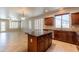 Elegant kitchen island featuring granite countertops and ample storage space at 3173 E Canyon Way, Chandler, AZ 85249