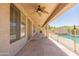 Expansive covered patio featuring ceiling fans and flagstone flooring, perfect for outdoor entertaining at 3173 E Canyon Way, Chandler, AZ 85249