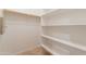 Clean walk-in closet with shelving for ample storage space at 3173 E Canyon Way, Chandler, AZ 85249
