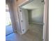 View of an empty room with tan walls and a tiled floor at 31774 N Bandit Rd, San Tan Valley, AZ 85143